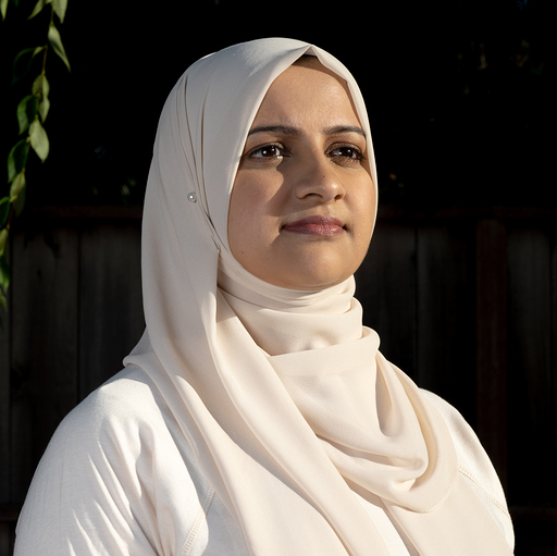 Square profile photograph of Nazneen Rajani